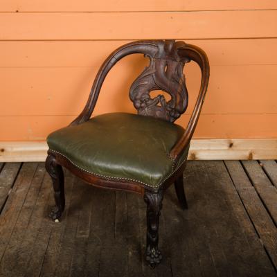 A Chinese carved dragon chair with leather seat 19th C 