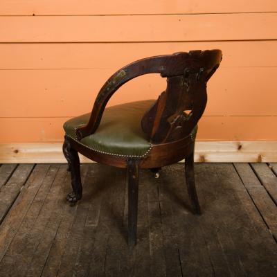 A Chinese carved dragon chair with leather seat 19th C 