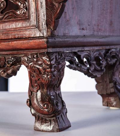 A Chinese small openwork wood cabinet depicting Dragons