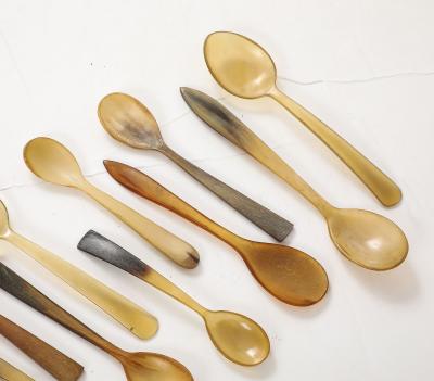A Collection of Carved Horn Teaspoons