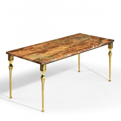 A Continental brass marble topped coffee table