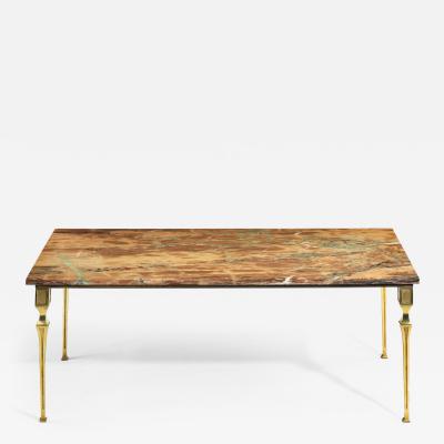 A Continental brass marble topped coffee table