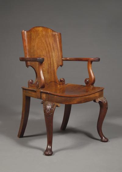 A Cuban Mahogany Armchair The Back In The Form Of A Paper Scroll