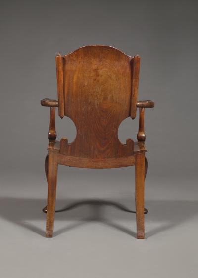 A Cuban Mahogany Armchair The Back In The Form Of A Paper Scroll