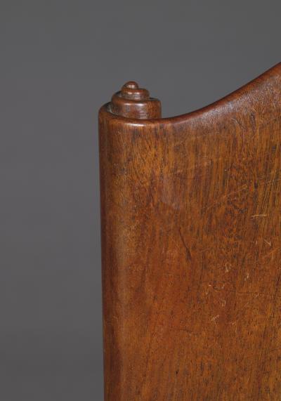 A Cuban Mahogany Armchair The Back In The Form Of A Paper Scroll