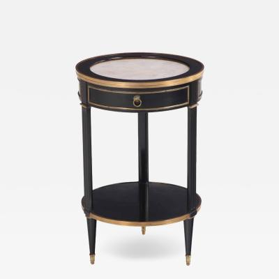 A Directoire style ebonized and bronze mounted marble top table C 1940 