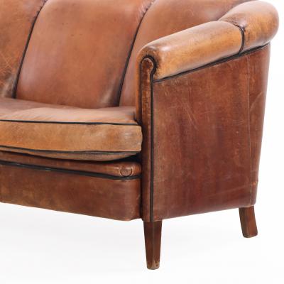 A Dutch Art Deco style Leather Sofa C 1960 