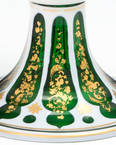 A EMERALD GREEN WHITE OVERLAID GOBLET WITH GILT DECORATION