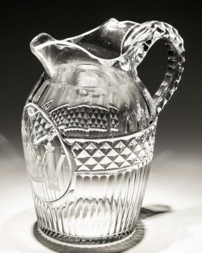 A FINE DIAMOND FLUTE CUT GEORGIAN MASONIC JUG