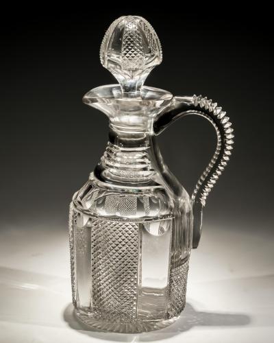 A FINE DIAMOND PILLAR CUT REGENCY CLARET JUG