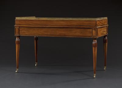 A FINE GEORGE III MAHOGANY CARLTON HOUSE WRITING TABLE