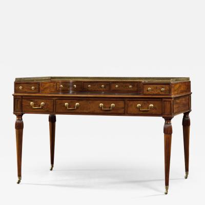 A FINE GEORGE III MAHOGANY CARLTON HOUSE WRITING TABLE