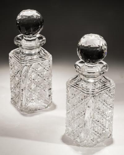 A FINE PAIR OF CRYSTAL WHISKEY DECANTERS