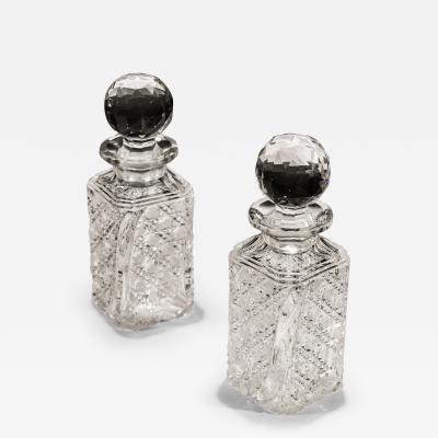 A FINE PAIR OF CRYSTAL WHISKEY DECANTERS
