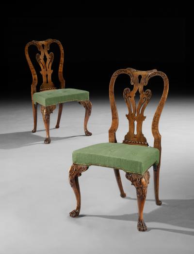 A FINE PAIR OF GEORGE II CARVED WALNUT SIDE CHAIRS