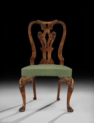 A FINE PAIR OF GEORGE II CARVED WALNUT SIDE CHAIRS