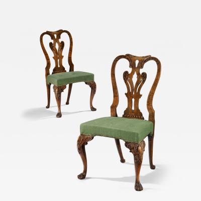 A FINE PAIR OF GEORGE II CARVED WALNUT SIDE CHAIRS
