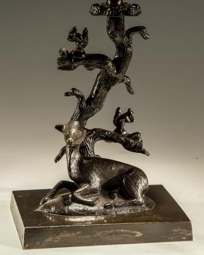 A FINE PAIR OF GILT BRONZED STAG DOE CANDLESTICKS