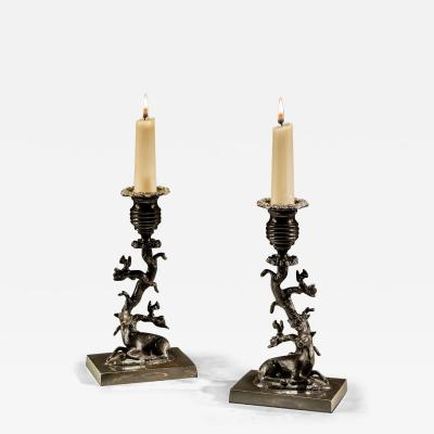 A FINE PAIR OF GILT BRONZED STAG DOE CANDLESTICKS