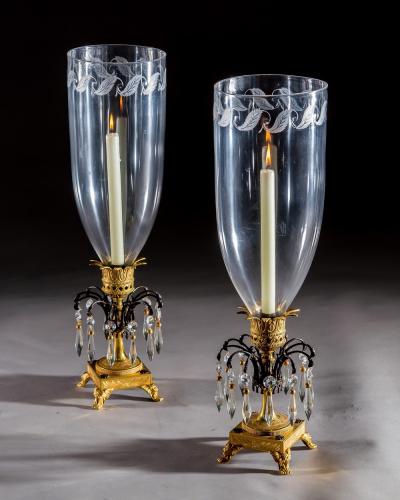 A FINE PAIR OF ORMOLU AND BRONZE REGENCY STORM LIGHTS