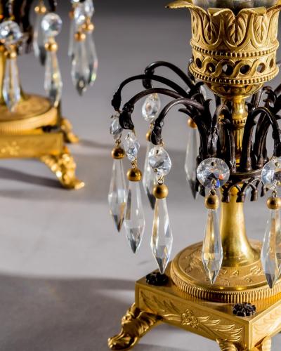 A FINE PAIR OF ORMOLU AND BRONZE REGENCY STORM LIGHTS