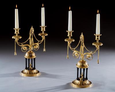A FINE PAIR OF ORMOLU AND BRONZE TEMPLE CANDELABRA