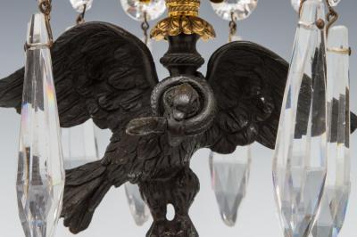 A FINE PAIR OF REGENCY EAGLE CANDLESTICKS