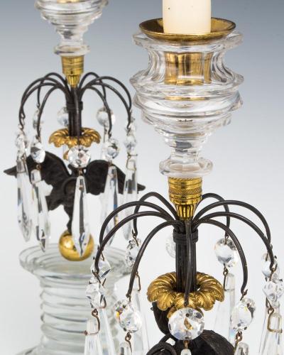 A FINE PAIR OF REGENCY EAGLE CANDLESTICKS