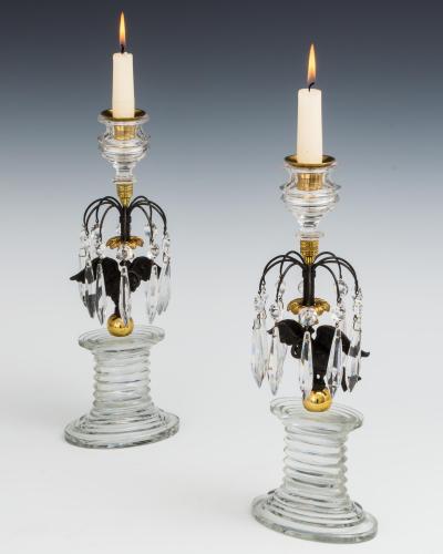 A FINE PAIR OF REGENCY EAGLE CANDLESTICKS