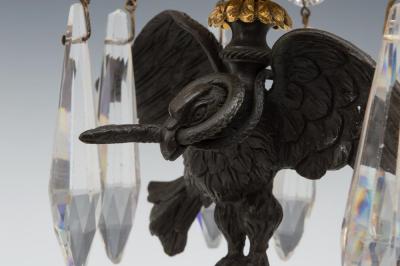 A FINE PAIR OF REGENCY EAGLE CANDLESTICKS