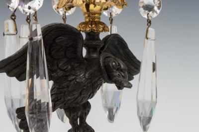 A FINE PAIR OF REGENCY EAGLE CANDLESTICKS