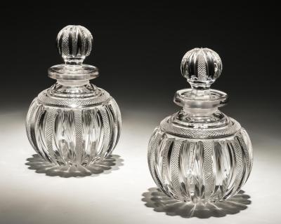 A FINE PAIR OF REGENCY PILLAR FILE CUT SCENT BOTTLES