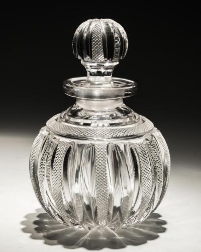 A FINE PAIR OF REGENCY PILLAR FILE CUT SCENT BOTTLES