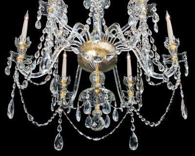 A FINE PAIR OF SIX LIGHT ORMOLU MOUNTED CUT GLASS ANTIQUE CHANDELIERS