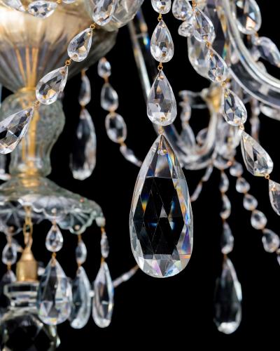 A FINE PAIR OF SIX LIGHT ORMOLU MOUNTED CUT GLASS ANTIQUE CHANDELIERS