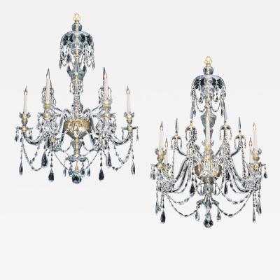 A FINE PAIR OF SIX LIGHT ORMOLU MOUNTED CUT GLASS ANTIQUE CHANDELIERS