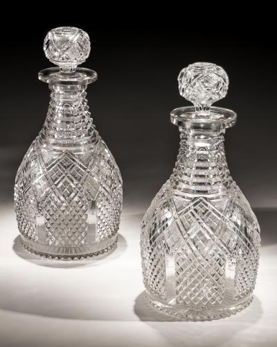 A FINE PAIR OF STEP DIAMOND PANELLED CUT GLASS MAGNUM REGENCY DECANTERS