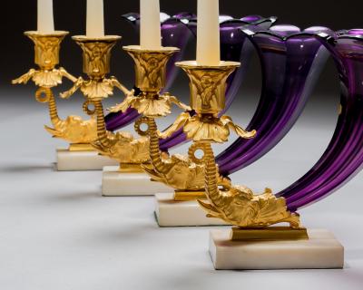 A FINE SET OF FOUR EARLY VICTORIAN AMETHYST CORNUCOPIA CANDLESTICKS
