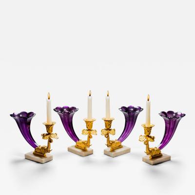 A FINE SET OF FOUR EARLY VICTORIAN AMETHYST CORNUCOPIA CANDLESTICKS