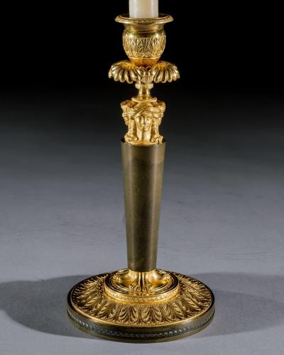 A FINE SET OF FOUR EMPIRE CANDLESTICKS BY CLAUDE GALLE