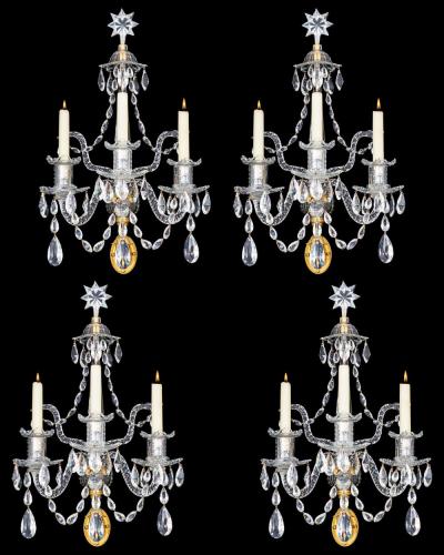 A FINE SET OF FOUR GEORGE III ORMOLU MOUNTED AND CUT GLASS WALL LIGHTS