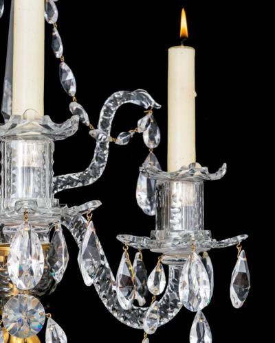 A FINE SET OF FOUR GEORGE III ORMOLU MOUNTED AND CUT GLASS WALL LIGHTS