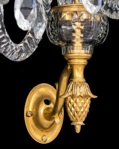 A FINE SET OF FOUR GEORGE III ORMOLU MOUNTED AND CUT GLASS WALL LIGHTS