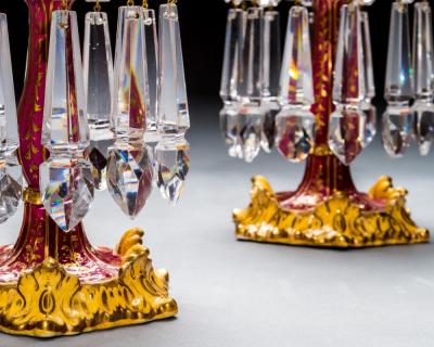 A FINE SET OF FOUR ROCKINGHAM PORCELAIN CANDLESTICKS