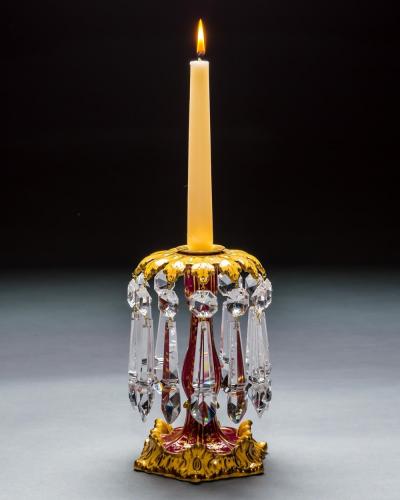 A FINE SET OF FOUR ROCKINGHAM PORCELAIN CANDLESTICKS