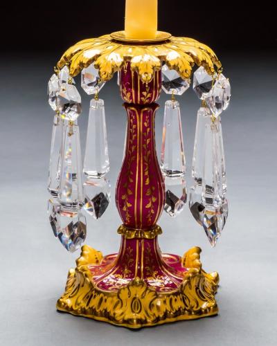 A FINE SET OF FOUR ROCKINGHAM PORCELAIN CANDLESTICKS