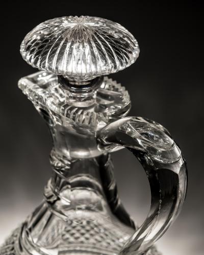 A FINELY CUT REGENCY SEMI SHIPS CLARET JUG
