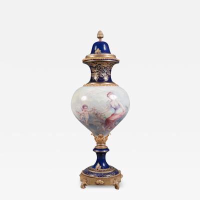 A FRENCH SEVRES STYLE PORCELAIN PAINTED VASE AND COVER 19TH CENTURY