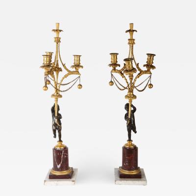 A Fine Pair of 18th Century Bronze and Gilt Bronze Candelabra