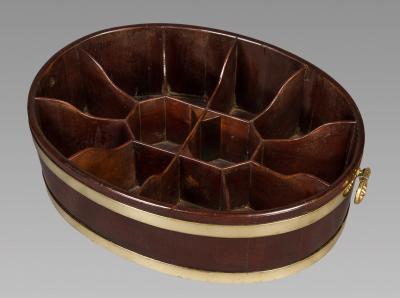 A Fine and Unique Oval and Brass Bound George III Mahogany Bottle Carrier